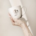 Kubek 300 ml - Panna / Virgo Biały kubek porcelanowy Nadzwyczajnie.pl ze złotym zdobieniem i napisem Panna / Virgo — 300 ml