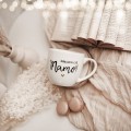 Biały kubek porcelanowy 300 ml - napis kocham cię mamo ze złotym sercem na dzień matki dla mamy Zbliżenie na złote zdobienie serca na białym kubku porcelanowym Kocham Cię Mamo Nadzwyczajnie.pl
