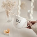 Kubek 300 ml - Kocham Cię Dziadku + Imię ZŁOTE SERCE Zbliżenie na złote zdobienie serca na białym kubku porcelanowym Kocham Cię Dziadku + Imię Nadzwyczajnie.pl