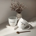 Zestaw 2 białych kubków porcelanowych 300 ml - motyw złotego serca z napisem Do końca życia i jeden dzień dłużej dla małżeństwa na rocznicę ślubu zestaw-kubkow-wesele-slub-zlote-serce.webp