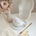 Biała filiżanka porcelanowa 250 ml ze spodkiem - złoty napis kochana mama dla mamy na Dzień Matki 3P4A0448.webp