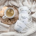 Zestaw 3 kubków świątecznych - zdobione złotem - Baby it's cold outside, Let it snow, Sweater weather Personalizowany zestaw porcelanowy ze złotym zdobieniem jako idealny prezent — porcelana premium Nadzwyczajnie.pl