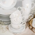 Zestaw obiadowo-deserowy na 6 osób - NAKRAPIANE ZŁOTEM Zbliżenie na złote zdobienie na białym zestawie porcelanowym obiadowo-deserowy na 6 osób - NAKRAPIANE ZŁOTEM Nadzwyczajnie.pl