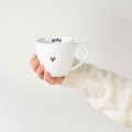 Biały kubek porcelanowy 300 ml - motyw złotego serca z napisem Spokój dla bliskiej osoby na każdą okazję Personalizowany kubek porcelanowy ze złotym sercem jako idealny prezent — porcelana premium Nadzwyczajnie.pl