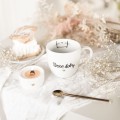 Biały kubek porcelanowy 300 ml - napis dzień dobry kotku ze złotym sercem na walentynki dla ukochanej osoby Biały kubek porcelanowy Nadzwyczajnie.pl ze złotym sercem i napisem Dzień dobry kotku — 300 ml