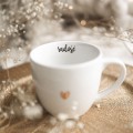 Biały kubek porcelanowy 300 ml - napis radość ze złotym sercem dla przyjaciółki na urodziny Zbliżenie na złote zdobienie serca na białym kubku porcelanowym Radość Nadzwyczajnie.pl