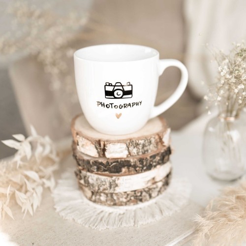 Biały kubek porcelanowy Nadzwyczajnie.pl ze złotym sercem i napisem Photography — 300 ml