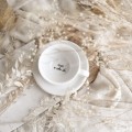 Biała filiżanka porcelanowa ze spodkiem 250 ml - złote serce i napis na dnie mam w sobie siłę dla kobiety na dzień kobiet Personalizowany filiżanka porcelanowa ze złotym sercem jako idealny prezent — porcelana premium Nadzwyczajnie.pl