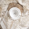 Biała filiżanka porcelanowa ze spodkiem 250 ml - złote serce i napis na dnie mam w sobie siłę dla kobiety na dzień kobiet Eleganckie opakowanie prezentowe filiżanki porcelanowej ze złotym sercem Nadzwyczajnie.pl — ze spodkiem - + mam w sobie