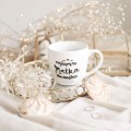 Biały Kubek Porcelanowy 300 ml - Motyw Złotego Serca i Napis Najlepsza Matka Chrzestna dla Matki Chrzestnej na Chrzest Biały kubek porcelanowy Nadzwyczajnie.pl ze złotym zdobieniem i napisem Biały Kubek Porcelanowy 300 ml - Motyw Złotego