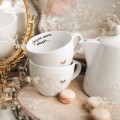 Zestaw Białej Porcelany Dzbanek 1 litra i 2 Kubki Porcelanowe 500 ml - Motyw Złotego Serduszka i Napis Jedyną Miarą Miłości Jest Miłość Bez Miary dla Pary na Walentynki Biały zestaw ze złotym zdobieniem Nadzwyczajnie.pl 3 Elementów Białej Porcelany Dzbanek 1 litra i 2 Kubki Porcelanowe 500