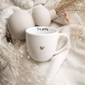 Kubek 300 I'm yours ZŁOTE SERCE Zbliżenie na złote zdobienie serca na białym kubku porcelanowym Kubek 300 I'm yours Nadzwyczajnie.pl