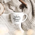 Biały kubek porcelanowy 300 ml - Złote serce i napis najlepszy mężczyzna na świecie na dzień mężczyzny dla mężczyzny Zbliżenie na złote zdobienie serca na białym kubku porcelanowym Najlepszy mężczyzna na świecie Nadzwyczajnie.pl