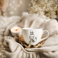 Biały kubek porcelanowy 500 ml - zimowy napis hello winter dla miłośników zimy na Boże Narodzenie Eleganckie opakowanie prezentowe kubka porcelanowego ze złotym zdobieniem Nadzwyczajnie.pl — Hello winter