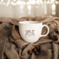 Biały kubek porcelanowy 1 litra - Motyw game on over na urodziny dla gracza Zbliżenie na złote zdobienie na białym kubku porcelanowym Kubek 1 litr - Game on/over Nadzwyczajnie.pl
