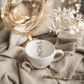 Biały kubek porcelanowy 500 ml - grafika trzech małych piesków na urodziny dla miłośników psów Eleganckie opakowanie prezentowe kubka porcelanowego ze złotym zdobieniem Nadzwyczajnie.pl — Trzy małe pieski