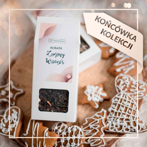 Biały produkt porcelanowy Nadzwyczajnie.pl ze złotym zdobieniem i napisem Herbata - Zimowy wieczór - świąteczna 50g