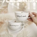 Zestaw 2 Białych Filiżanek Porcelanowych ze Spodkami 250 ml - Napis I Ślubuję Ci Uśmiech Przy Porannej Kawie dla Pary na Ślub Filiżanka porcelanowa ze złotym zdobieniem 2 Białych Filiżanek Porcelanowych ze Spodkami 250 ml - Napis I Ślubuję Ci