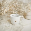 Biały Kubek Porcelanowy 300 ml - Motyw Złotego Serca i Napis Z Pozytywną Energią dla Przyjaciółki na Dzień Kobiet Biały kubek porcelanowy Nadzwyczajnie.pl ze złotym zdobieniem i napisem Biały Kubek Porcelanowy 300 ml - Motyw Złotego