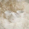 Biały kubek porcelanowy 300 ml - napis to twój dzień z motywem złotego serca na urodziny dla bliskiej osoby Eleganckie opakowanie prezentowe kubka porcelanowego ze złotym sercem Nadzwyczajnie.pl — to Twój dzień
