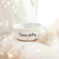 Biała miska porcelanowa - napis Dzień dobry misiu ze złotym sercem dla ukochanej osoby na rocznicę związku Zbliżenie na złote zdobienie serca na białym produkcie porcelanowym Miska - Dzień dobry misiu Nadzwyczajnie.pl